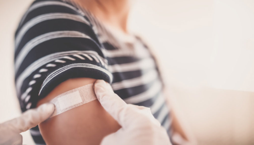 Woman and a doctor in the hospital after vaccination against Covid 19.