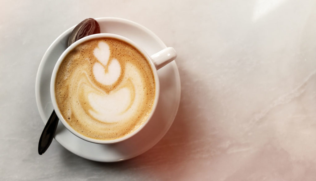 tasty-classic-traditional-italian-coffee-cappuccino-on-table-in-cafe-day-light-top-view-with-copy-space-web