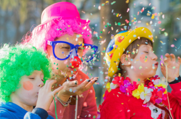 mother-her-children-are-playing-with-confetti-carnival-costume-web
